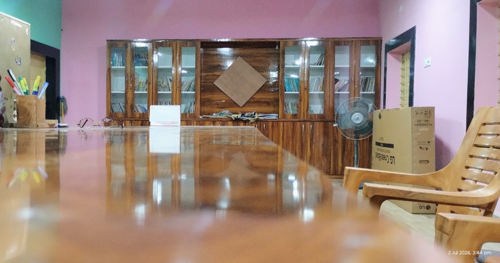 Library office with book cabinets and study table