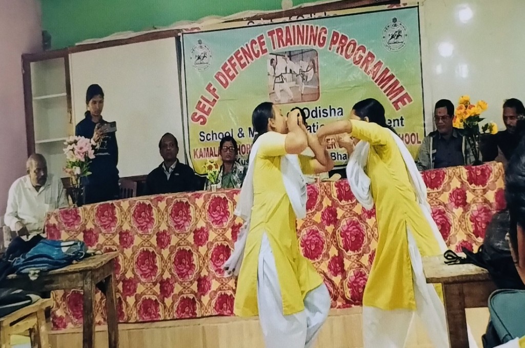 Students practising self-defence during a government training programme