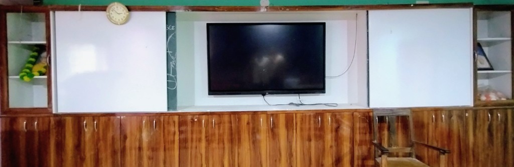Smart classroom with interactive display and teaching boards